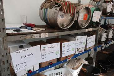 A picture containing indoor, barrel, wall, sale

Description automatically generated