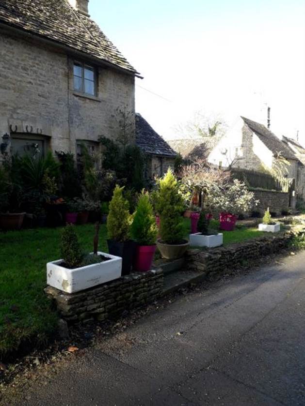 A picture containing building, outdoor, house, stone

Description automatically generated
